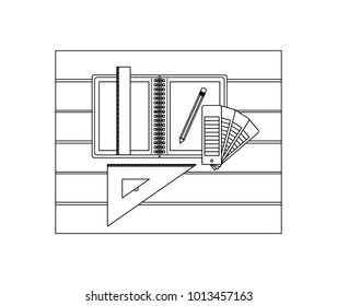 drawing tools and notebook over table top view in black contour