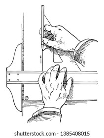 Drawing a Vertical Line held against the T-square, restrict the angle of the straight line to multiples, vertical line by simply using height, vintage line drawing or engraving illustration.