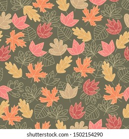Drawn linear and colored autumn leaves form a seamless pattern. Vector full color graphics