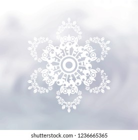 Drawn snowflake on the grey background.