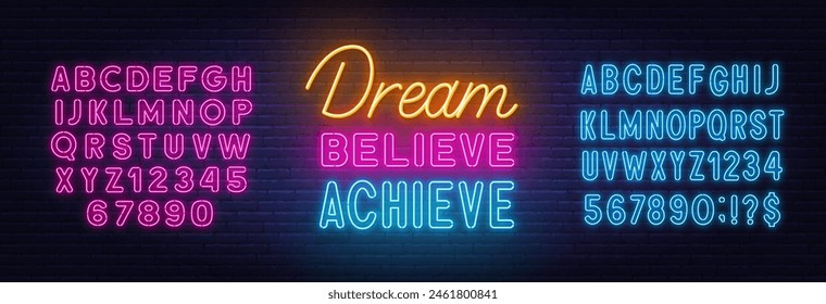 Dream Believe Achieve Neon Schriftzug auf Backsteinwand Hintergrund