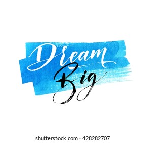 Dream big card. Hand drawn blue watercolor background. Modern brush calligraphy. Hand drawn lettering background. Ink illustration. Isolated on white background. 