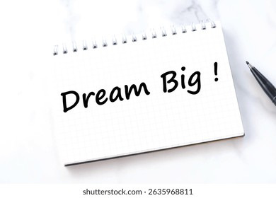 Dream Big, text words typography written on notebook, life and business motivational inspirational concept