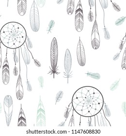 Dream catcher and feathers. Vector seamless pattern