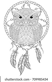 Dream catcher with owl. Tattoo or adult antistress coloring page. Black and white hand drawn doodle for coloring book