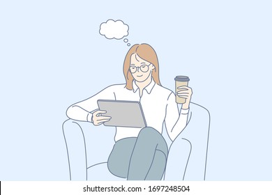 Dream, coffee break, news, social media concept. Young happy businesswoman or girl clerk manager sittting in chair, reading news on tablet in office. Coffee break at work. Social media communication.