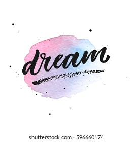 Dream hand drawn lettering on violet watercolor splash.