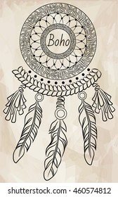Dreamcatcher with feathers. Boho chic style.