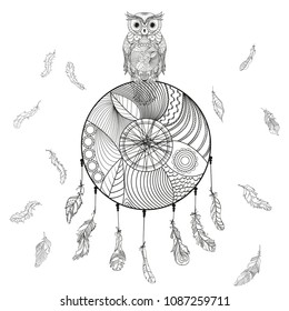 Dreamcatcher with owl. Flying feathers. Hand drawn image. Zentangle. Black and white illustration for coloring. Zen art. Design for spiritual relaxation for adults. Unique image for design