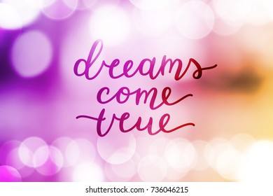 dreams come true, vector lettering on blurred background
