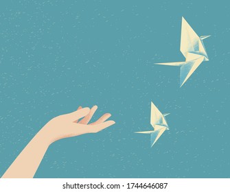 Sueños y antecedentes de concepto de libertad . Una mano hembra o para niños y las aves de la grúa de papel de origami . Fondo azul con lugar para el texto. Ilustración estilizada del material de textura.