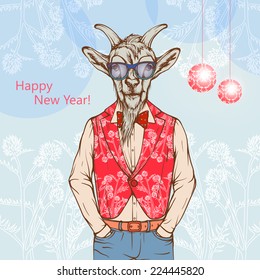 Dressed in clothes goat with glasses on the floral elements background with Christmas balls. Symbol of the new year 