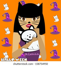 dressed woman holding a cat in her hands