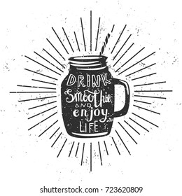 Drink smoothie and enjoy life. Vector illustration with smoothie jar with a straw, scroll and sunburst on white background with grunge texture. Typography print, poster, card design.