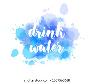 Drink water - handwritten modern calligraphy lettering on watercolor paint splash baclground. Healthy life concept illustration. Blue colored.