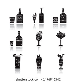 Drinks drop shadow black glyph icons set. Rum, absinthe, whiskey, sambuca, sangria, hurricane, flaming cocktail and shot, highball glass. Alcoholic beverages for party. Isolated vector illustrations