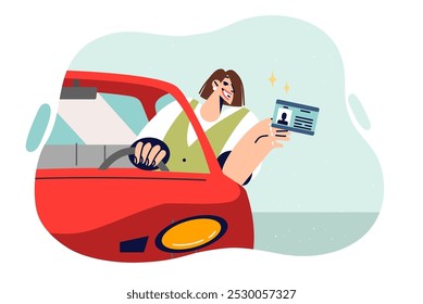 Driver license in hands of woman sitting behind wheel of car, confirming right to access parking lot. Happy girl demonstrates driver license after long training at automobile school