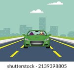 Driving a green beautiful car on a free road at day time beautiful scene front view.  