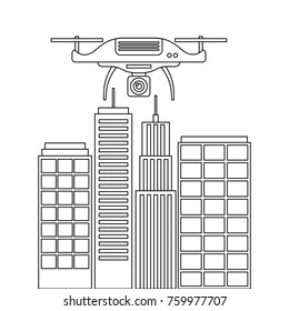drone with camera flying on city landscape buildings
