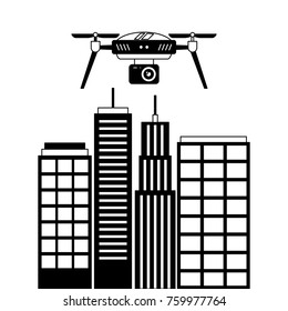 drone with camera flying on city landscape buildings