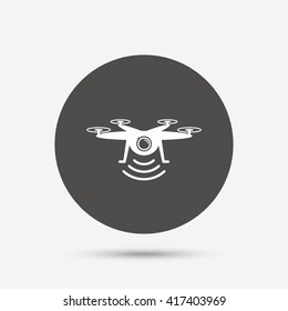 Drone icon. Quadrocopter with action camera symbol. Gray circle button with icon. Vector