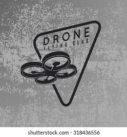 Drone logo concept on grey grunge background