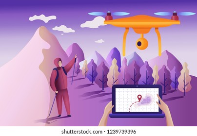 Drone or quadcopter for geolocation. Drone fly over the landscape and makes the search for the lost. Hands controlling the drone via laptop.