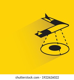 drone scanning farm area with shadow on yellow background