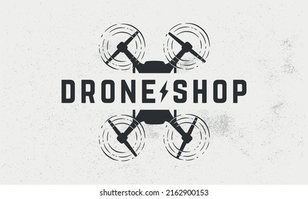 Drone, UAV shop logo, poster. Drone trendy logo with drone silhouette. Vector emblem template.