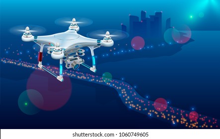 Drone with video camera In The Air Over City Roadway. Unmanned Aircraft System or UAV monitoring street traffic or photography urban landscape in the Night .