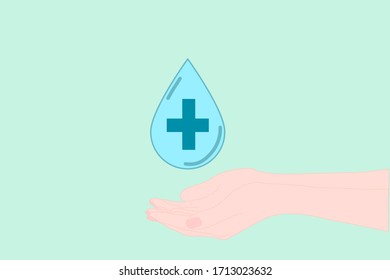 Drop with cross is floating Over hands. Sanitizer concept. Blood donate concept.  Medical concept. 