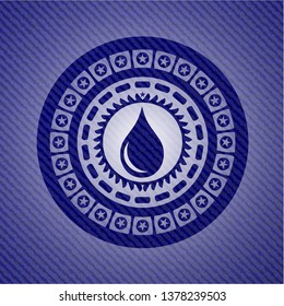 drop icon inside badge with denim texture