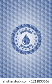 drop icon inside blue badge with geometric pattern.