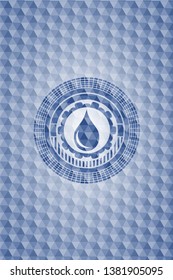 drop icon inside blue polygonal badge.