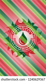 drop icon inside christmas colors badge.