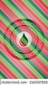 drop icon inside christmas colors badge.