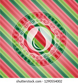 drop icon inside christmas style emblem.