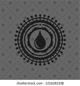 drop icon inside dark badge or emblem