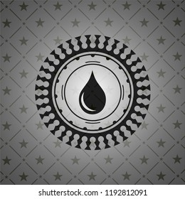 drop icon inside dark emblem
