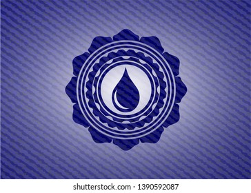 drop icon inside emblem with denim high quality background