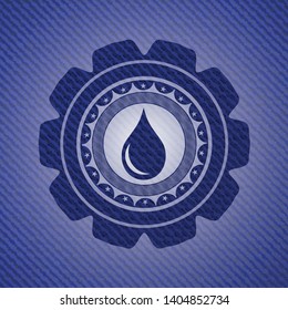drop icon inside emblem with denim high quality background