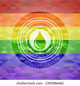 drop icon inside emblem on mosaic background with the colors of the LGBT flag
