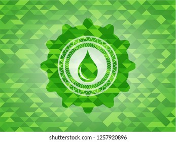 drop icon inside green emblem with triangle mosaic background