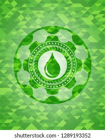 drop icon inside green emblem with mosaic background