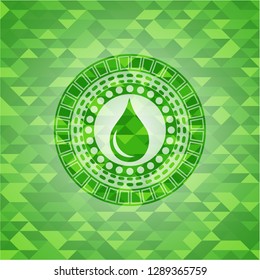 drop icon inside green emblem with mosaic ecological style background
