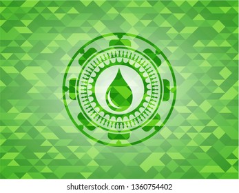 drop icon inside green emblem with mosaic ecological style background