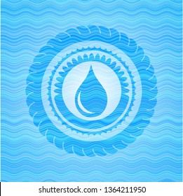 drop icon inside light blue water badge background.