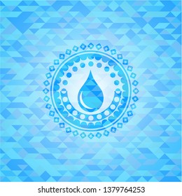 drop icon inside light blue emblem with triangle mosaic background