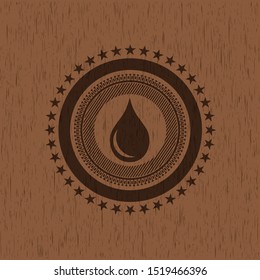drop icon inside realistic wood emblem