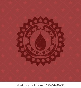 drop icon inside red emblem